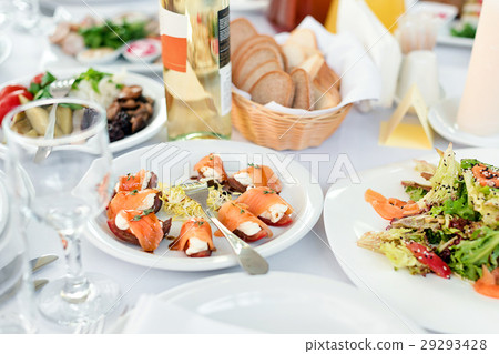 Restaurant table with food. Tasty appetizers 29293428