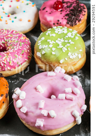 Glazed donuts with different fillings Glazed donuts with different fillings 29294591