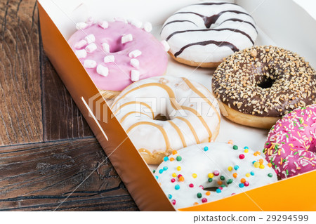 glazed donuts with different fillings 29294599