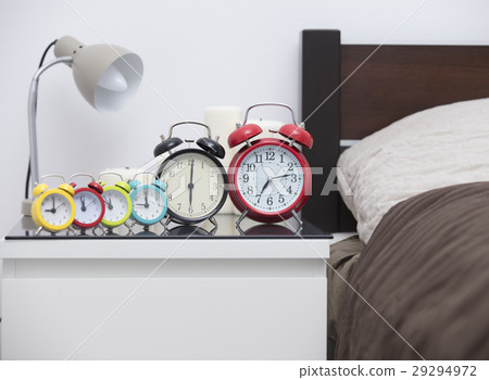 alarm clocks of different shapes and colors alarm clocks of different shapes and colors 29294972