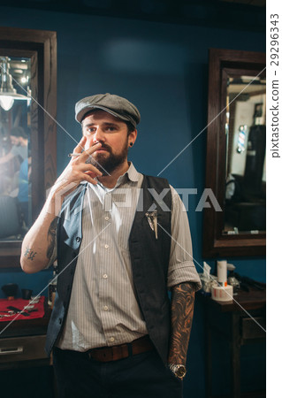 Young man smoking indoor free space 29296343