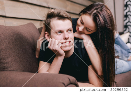happy couple lying in bed at hotel happy couple lying in bed at hotel 29296862