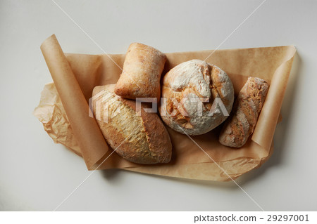 Different kinds of bread on background Different kinds of bread on background 29297001