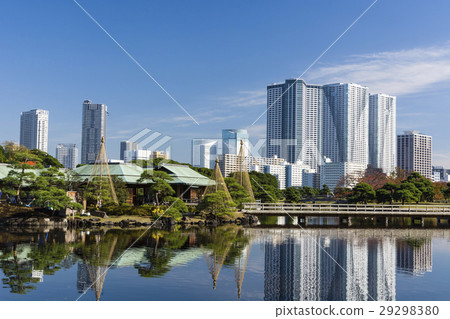 The Hamarikyu Garden Of Autumn And The Tower Stock Photo