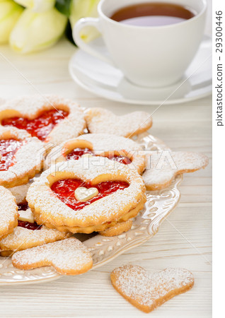 Shortbread cookies in shape of heart with jam Shortbread cookies in shape of heart with jam 29300446