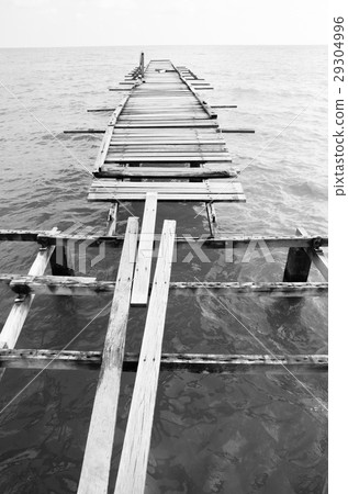 Wooden pier on the sea background 29304996