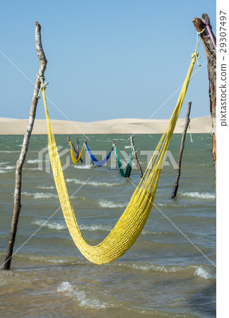 Hammocks on the beach of the lake Tatajuba Hammocks on the beach of the lake Tatajuba 29307497
