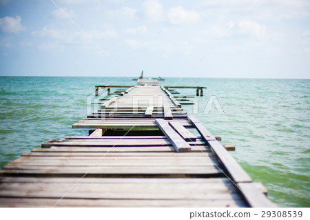 Wooden pier on the sea background Wooden pier on the sea background 29308539