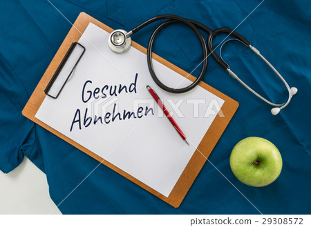 Gesund Abnehmen (in german Healthy Dieting) Clipboard with steth 29308572