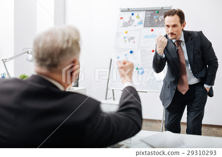 Confident employee expressing opinion with 29310293