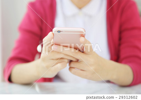 one asian woman with smart phone one asian woman with smart phone 29312602