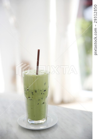 Iced green tea latte in white coffeeshop 29312850