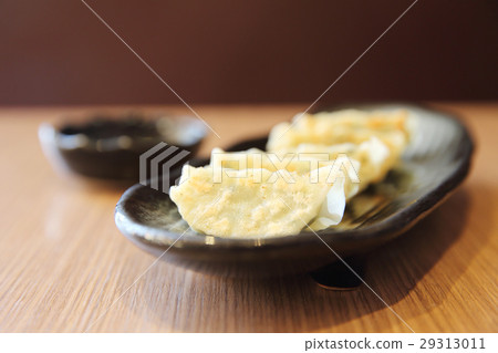 gyoza on wood background 29313011