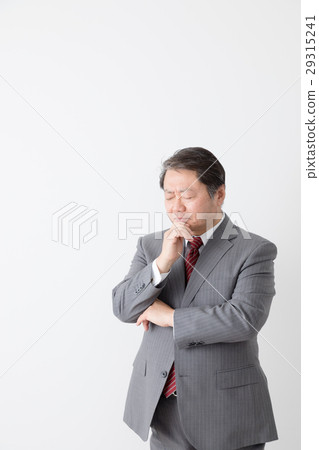 擊中在他的下巴的商人手，認為，憂慮，中年人 29315241