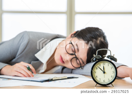 Tired woman are sleeping in the office Tired woman are sleeping in the office 29317025