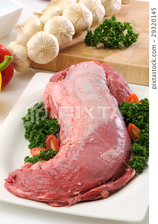 raw beef rib eye steak isolated with vegetable. 29320145