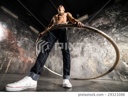 Circus artist in aCyr Wheel 29321086