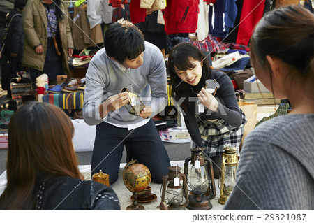 A couple enjoying a flea market A couple enjoying a flea market 29321087