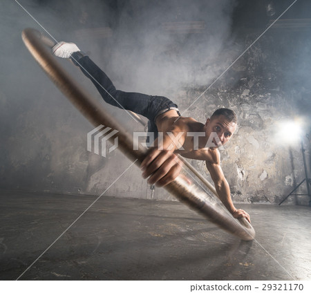 Circus artist in aCyr Wheel Circus artist in aCyr Wheel 29321170