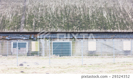 Broken roof of an abandoned farm Broken roof of an abandoned farm 29324352