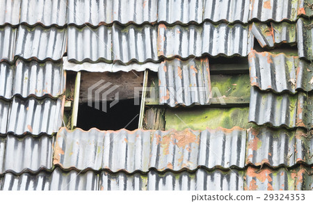 Broken roof of an abandoned farm Broken roof of an abandoned farm 29324353