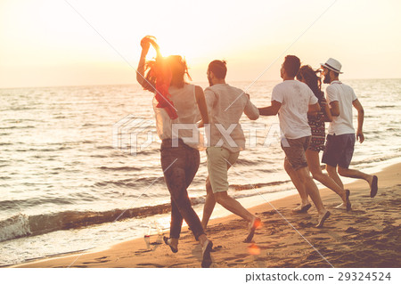Group of happy young people is running on 29324524