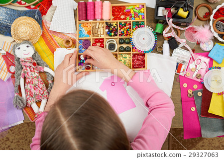 girl sews doll clothes top view sewing accessories girl sews doll clothes top view sewing accessories 29327063