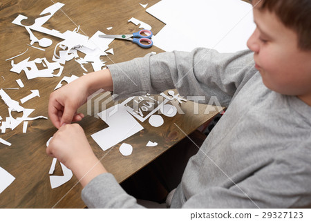 boy makes origami - car and family children parent 29327123