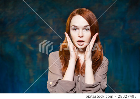 young emotional redhead girl shout with hands near 29327495