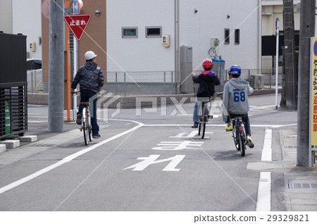 Children playing on a bicycle 29329821