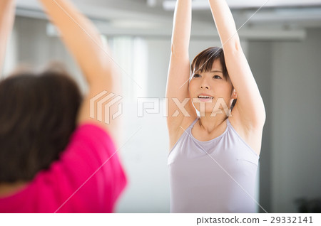 Yoga instructor young lady 29332141