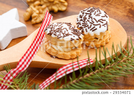 Christmas sweets on a wooden spoon 29334071