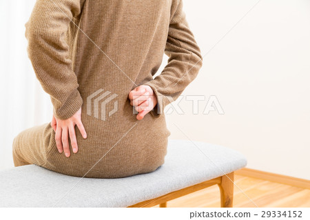 Back pain Lumbar pain Negative image Female Portrait 20's 30's 29334152