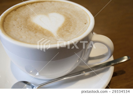 Capuchino coffee in a white cup Capuchino coffee in a white cup 29334534