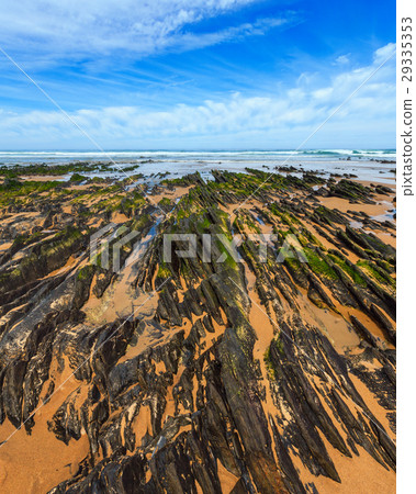 Rock formations on sandy beach (Portugal). Rock formations on sandy beach (Portugal). 29335353