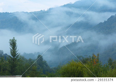 Evening mist in mountain. Evening mist in mountain. 29335374