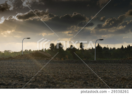 Wide angle shot of dramatic sunset with flare and 29338261