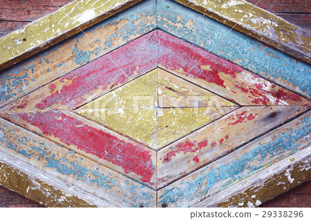 Old colorful wall. Dry peeling paint. Aged photo. 29338296