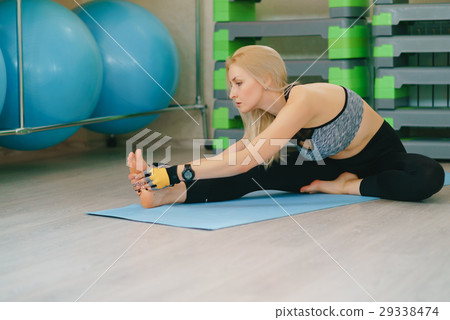 Fitness girl stretching yoga gym Fitness girl stretching yoga gym 29338474