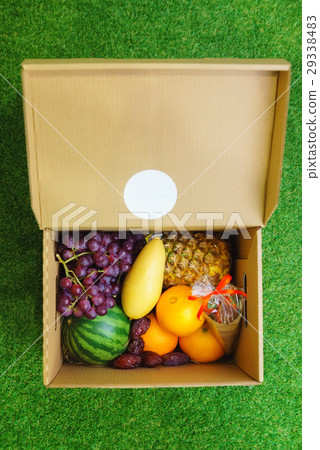 Fresh fruit in a cardboard box Fresh fruit in a cardboard box 29338483
