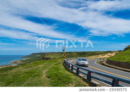 Blue sky strait and road car 29340573
