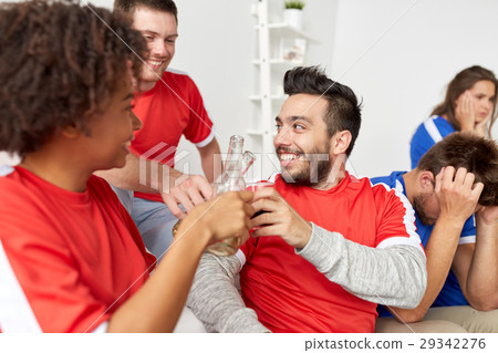 happy football fans or friends with beer at home happy football fans or friends with beer at home 29342276