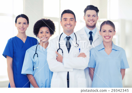 group of happy doctors at hospital 29342345