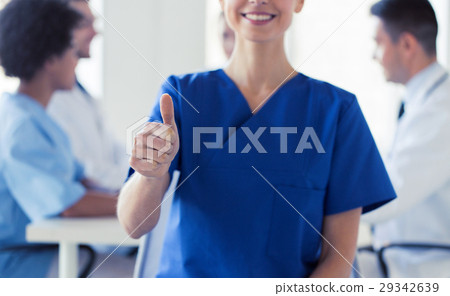 close up of doctor showing thumbs at hospital 29342639