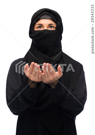 praying muslim woman in hijab over white praying muslim woman in hijab over white 29343333
