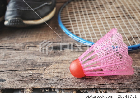 Shuttlecocks with badminton racket and shoes sport 29343711