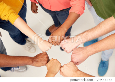 hands of international people making fist bump 29344278