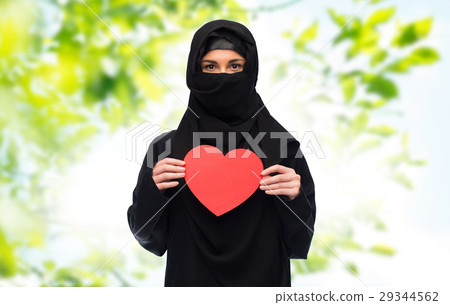 muslim woman in hijab holding red heart muslim woman in hijab holding red heart 29344562