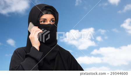 muslim woman in hijab over white background muslim woman in hijab over white background 29344600