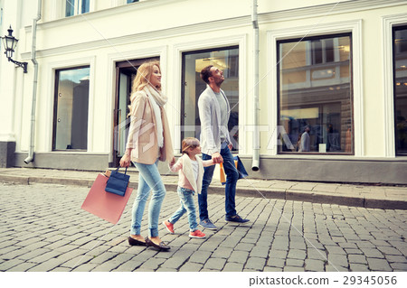 happy family with child and shopping bags in city happy family with child and shopping bags in city 29345056